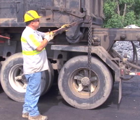 Safe Opening and Closing of Material Container Doors